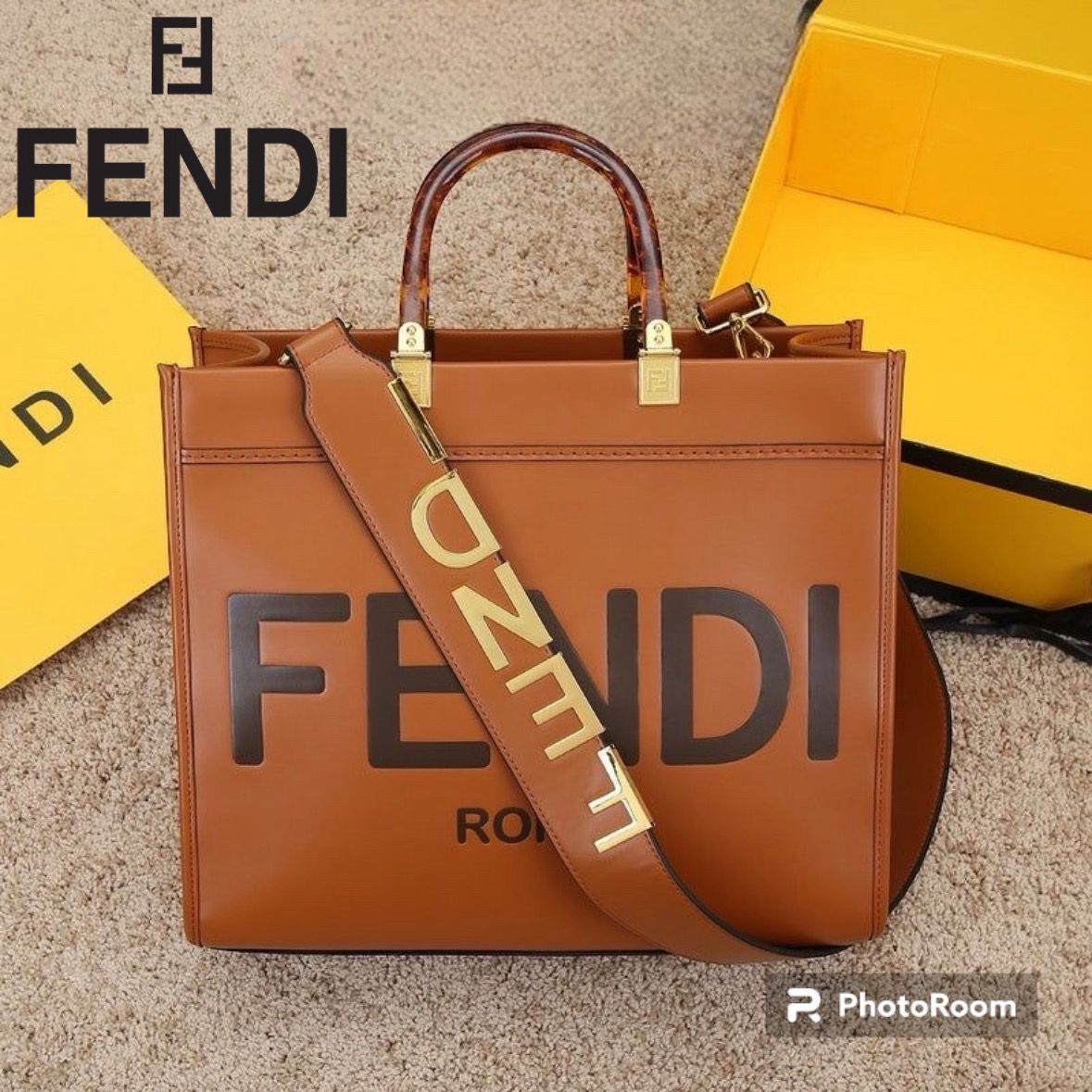 FENDI METAL INITIAL ON SLING BELT