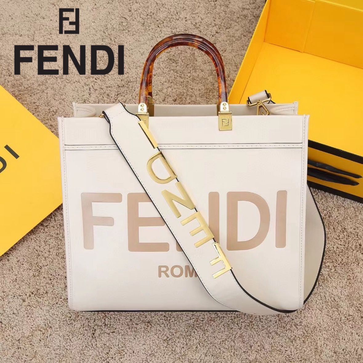 FENDI METAL INITIAL ON SLING BELT