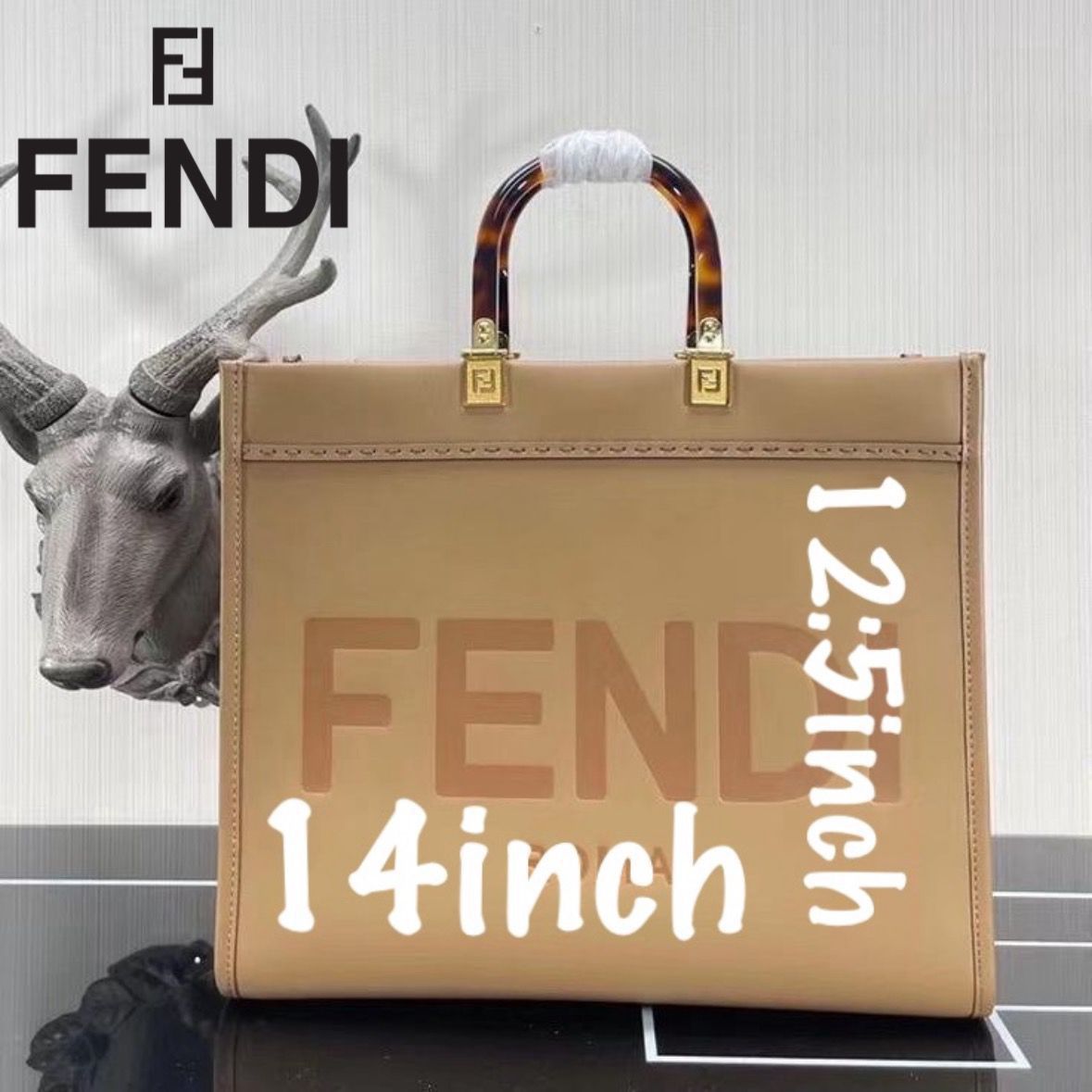 FENDI METAL INITIAL ON SLING BELT