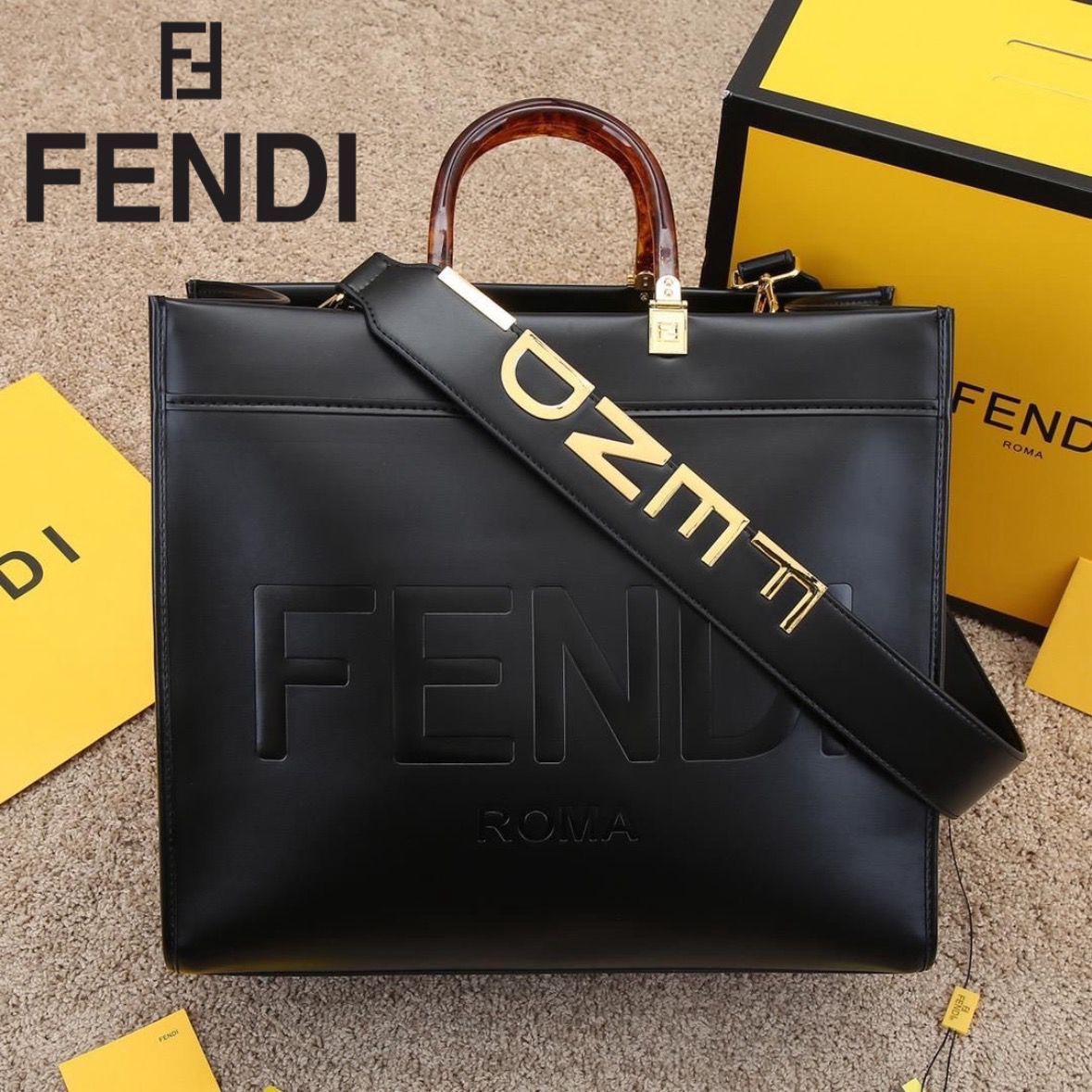 FENDI METAL INITIAL ON SLING BELT